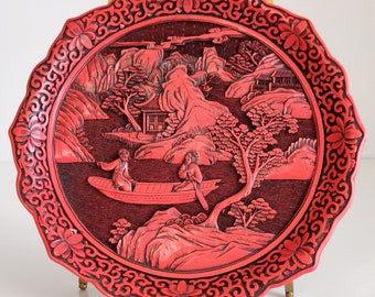 Vintage Cinnabar style carved plate, red and black