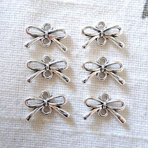 Small Silver Bow Links, Connectors, Charms, Bow Knots, 1/2" Wide, Tied Ribbon Bows
