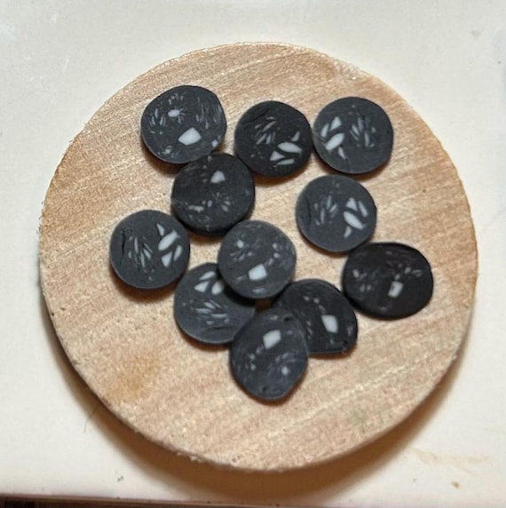 Dollhouse miniature cooked black pudding  slices 1/6 by Wyrdworldminiatures