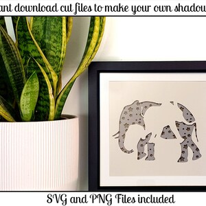 May include: A white silhouette of an elephant with a star pattern background inside a black frame. The text "SVG and PNG Files included" is below the frame.