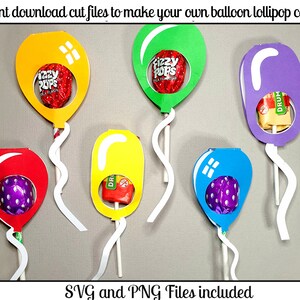 May include: Six colorful balloon lollipop covers with cut-out windows to display lollipops. The balloons are yellow, green, purple, red, yellow, and blue. The text "Fizzy Pops" and "Drum" are visible on the lollipops.