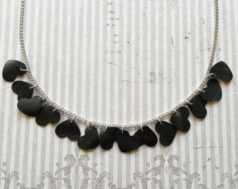 Minimalistic hearts inner tube necklace made of rubber of a Dutch bicycle recycling great gift eco friendly