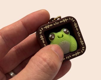 Cosy Frog in a Bookcase Tactile Fidget Clicker with Keychain