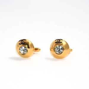 Chanel Cufflinks GP gold logo silver crystal Good
