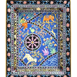 May include: Rectangular decorative tray with a black border and a gold rim. The tray's interior features a blue background with colorful illustrations of a bear, goat, birds, and a musician. Floral and geometric patterns complete the design.