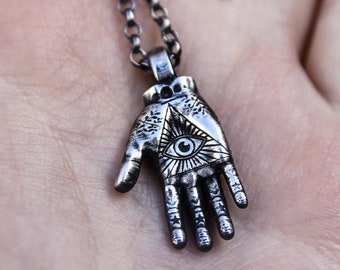 Palmistry hand necklace, third eye