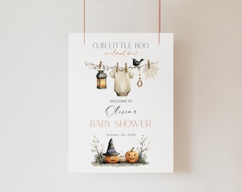 Plantilla editable de cartel de bienvenida para baby shower con temática de Halloween y lavandería. Cartel de bienvenida para baby shower con tendedero, lindo y espeluznante. El pequeño Boo está a punto de dar a luz.