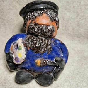 Funny bearded gnome  artist painter,  handmade ceramic figurine