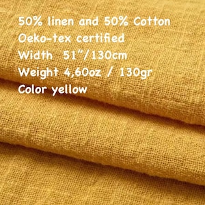 Può includere: Primo piano di tessuto giallo composto da 50% lino e 50% cotone. Il tessuto è certificato Oeko-tex, largo 130 cm e pesa 130 grammi. Il testo sul tessuto recita "Color yellow".