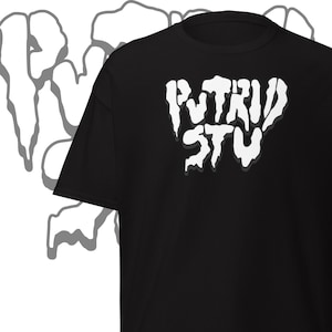May include: Black t-shirt with the white text "PUTRID STU" in a dripping font. The shirt has short sleeves and a crew neck. A gray, abstract design is visible in the background.
