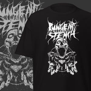 May include: Black t-shirt featuring a white graphic of a screaming skull with the text "Pungent Stench" in a gothic font. The design includes skeletal hands and a diamond shape. The shirt is displayed on a gray background.