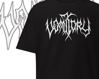 May include: Black t-shirt with the white text "VOMITORY" in a gothic font. A matching white graphic is visible in the background. The shirt is a short-sleeved crew neck.