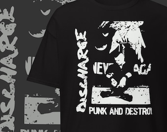 May include: Black t-shirt with a white graphic design. The design includes the word "DISCHARGE" vertically, a stylized image of a person, and the words "PUNK AND DESTROY". The shirt has a crew neck and short sleeves.