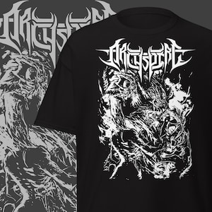 May include: Black t-shirt with a white graphic. The design features the band name "Orcyspire" above a detailed illustration of a creature. The shirt has a classic crew neck and short sleeves.