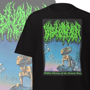 May include: Black t-shirt featuring a neon green graphic design on the front and a matching design on the upper left. The front graphic includes an alien illustration with the text "Hidden History of the Human Race" in a green, stylized font.