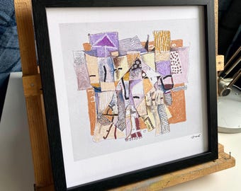 May include: Abstract art print in a black frame. The artwork features a collage of geometric shapes and patterns in shades of purple, orange, and beige. The piece is signed in the bottom right corner. The framed art is displayed on a wooden easel.