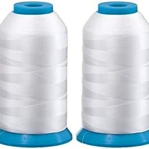 May include: Two spools of white thread with bright blue bases and tops. The thread is tightly wound around the spools, creating a cylindrical shape. The spools are identical in size and shape, and are set against a plain background.
