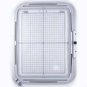 May include: White plastic embroidery hoop with a grid pattern and the text "Hoop 4x4-250 mm 10x10 inch" printed on the side. The hoop has a left and right side marked with "L" and "R" respectively.
