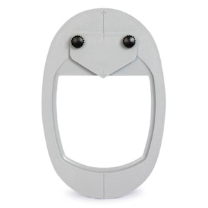 May include: A light gray oval-shaped plastic frame featuring a central rectangular cutout. The top section includes a smaller, adjustable gray plate secured by two black circular knobs, with engraved upward and downward pointing arrows.
