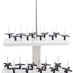 May include: White sewing thread stand with two tiers. Each tier has multiple black thread holders. The stand has a white base and a silver adjustable height pole.