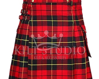 May include: A red, black, and yellow plaid kilt with adjustable straps and brass-colored hardware. The kilt features a pleated design and a pocket on the side. The text "Kilt Studio Kilt & Accessories" is printed on the kilt.