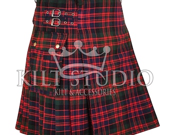 May include: A red, green, and navy blue plaid kilt with gold-colored hardware. The kilt features pleats, adjustable straps, and the text "KILT STUDIO KILT & ACCESSORIES".