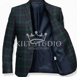 May include: A green and navy plaid blazer with a navy blue lining. The blazer features a two-button closure and a notched lapel. The text "KILT STUDIO KILT & ACCESSORIES" is visible inside.