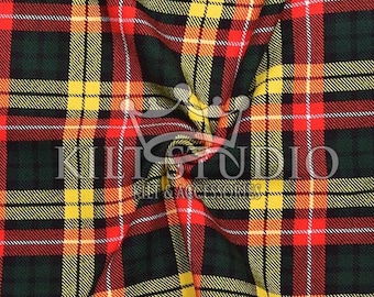 May include: Close-up of a vibrant plaid fabric with a repeating pattern of red, yellow, green, and black lines. The fabric has a textured appearance and the text "Kilt Studio" is visible. This textile is suitable for kilts and accessories.