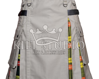 May include: A gray kilt with black leather straps and pockets. The kilt features a colorful plaid design on the front and sides. The text "KILT STUDIO KILT & ACCESSORIES" is printed on the front.