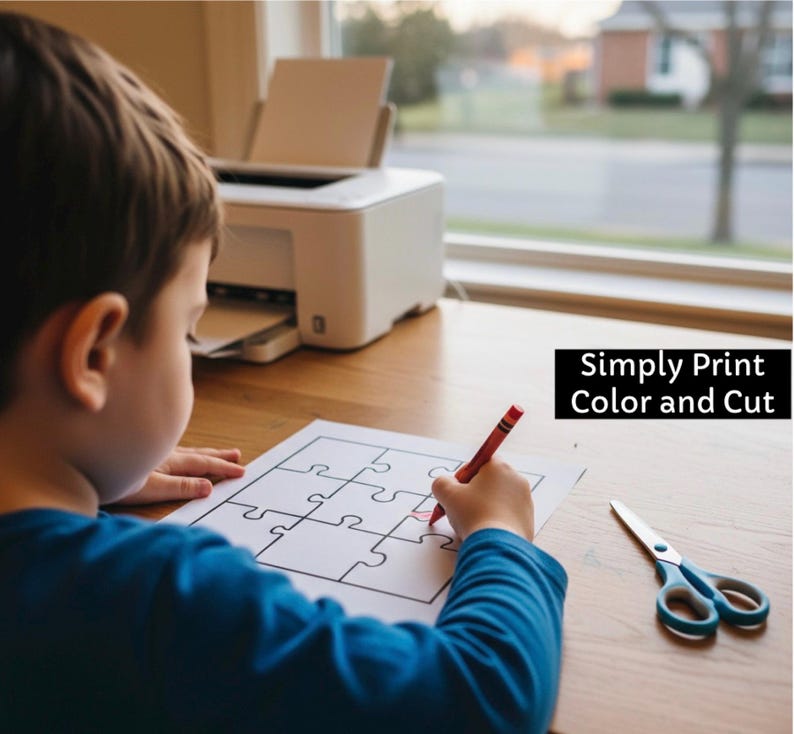 May include: A child using a red crayon to colour a jigsaw puzzle printed on white paper. Scissors with blue handles are on the table. A white printer is in the background. The text "Simply Print Color and Cut" is displayed.