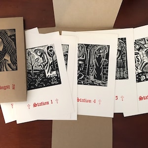 May include: A set of 4 black and white woodcut prints depicting scenes from the Stations of the Cross. The prints are titled "Station 1", "Station 4", "Station 5", and "Station 10".