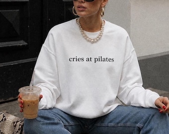 cries at the pilates sweatshirt