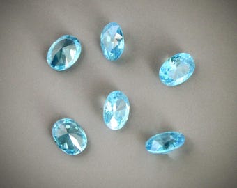 Qty 4, Aquamarine/Clear Oval Brilliant Faceted 8mm x 6mm Cubic Zirconia