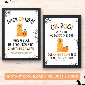 May include: Two framed Halloween signs in black frames. One says "Trick or Treat" with a golden retriever and pumpkin. The other says "Oh, Boo!" with a golden retriever and pumpkin. Includes 4 signs.