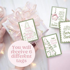 以下が含まれることがあります： 秘密のサンタギフトタグのコレクション。お祝いのデザインです。「From Your Secret Santa」や「Your Secret Santa Was Here」などのテキストが表示されます。画像には、包装されたギフトと装飾要素が含まれています。