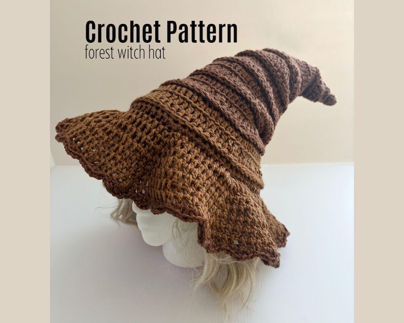 May include: A brown crochet witch hat with a wide, scalloped brim and a pointed crown. The hat is displayed on a mannequin head. The text "Crochet Pattern forest witch hat" is at the top of the image.