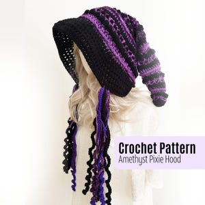 May include: A black and purple crochet pixie hood with a long, pointed tip. The hood has a striped pattern in purple and black, with long, curly fringe in matching colours. The text "Crochet Pattern Amethyst Pixie Hood" is visible.