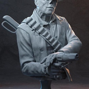 Könnte beinhalten: Detaillierte Büstenskulptur einer Cowboy-Figur, die einen Hut, einen Mantel und einen Bandelier trägt. Die Figur hält einen Revolver. Die Skulptur ist hellgrau und auf einem Sockel montiert.