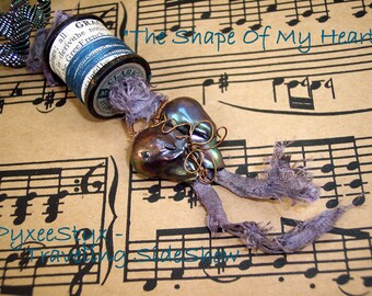Sutured Heart necklace - Baroque Pearl, recycled spools, sari silk, vintage skeleton key, mother of pearl buttons - The Shape Of My Heart