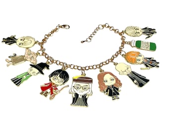 Bransoletka z zawieszkami w kolorze złota inspirowana Czarodziejem Potterem, regulowana, w torebce prezentowej z organzy