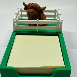 Post-it-hållare med höglandskon