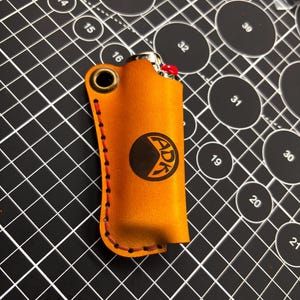 leather Bic lighter case with bic pen removal hole