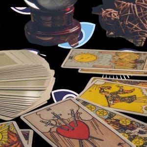 May include: A collection of tarot cards with various illustrations, including the sun, moon, and a heart pierced by swords. A crystal ball and decorative objects are also present, set against a black background.