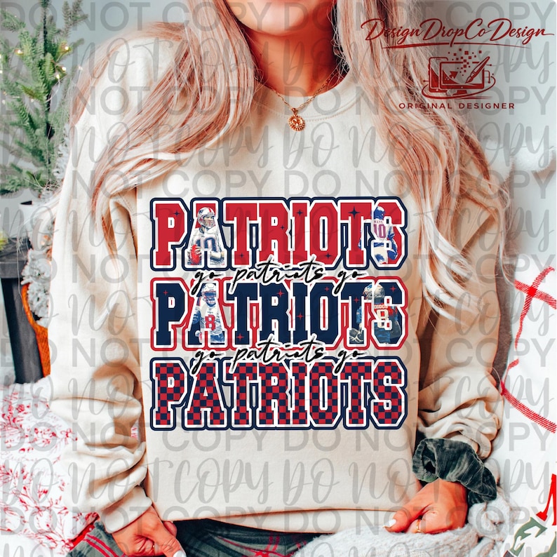 May include: A beige sweatshirt with a graphic design featuring the word "PATRIOTS" in red, white, and blue, repeated three times. The design includes football player illustrations and the phrase "go patriots go".