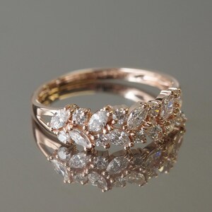 Alternating marquise and round diamond band by HN Jewelry