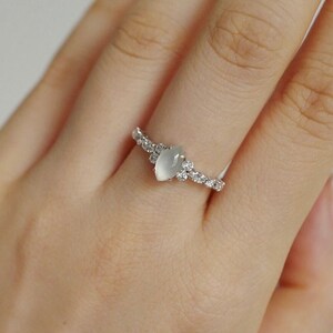 white jade ring, marquise jade ring, white jade engagement ring, unique engagement ring, unique diamond ring, lab diamond ring, lab grown diamond ring, moissanite ring, moissanite jewelry, best lab diamond jewelry, lab diamond near me