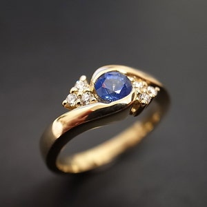 Diamonds Wedding Ring with Blue Sapphire in 14K Yellow Gold image 1