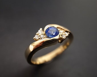 Diamonds Wedding Ring with Blue Sapphire in 14K Yellow Gold