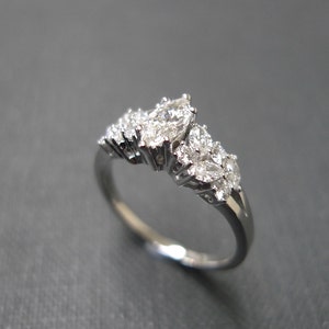 marquise engagement ring, unique engagement ring, diamond engagement ring, online engagement ring, anniversary ring, engagement ring, anniversary gift, promise ring, proposal ring, diamond ring, Art Deco ring, modern engagement ring, marquise ring