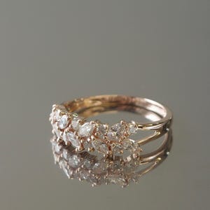 Close-up of marquise diamond band reflecting soft light